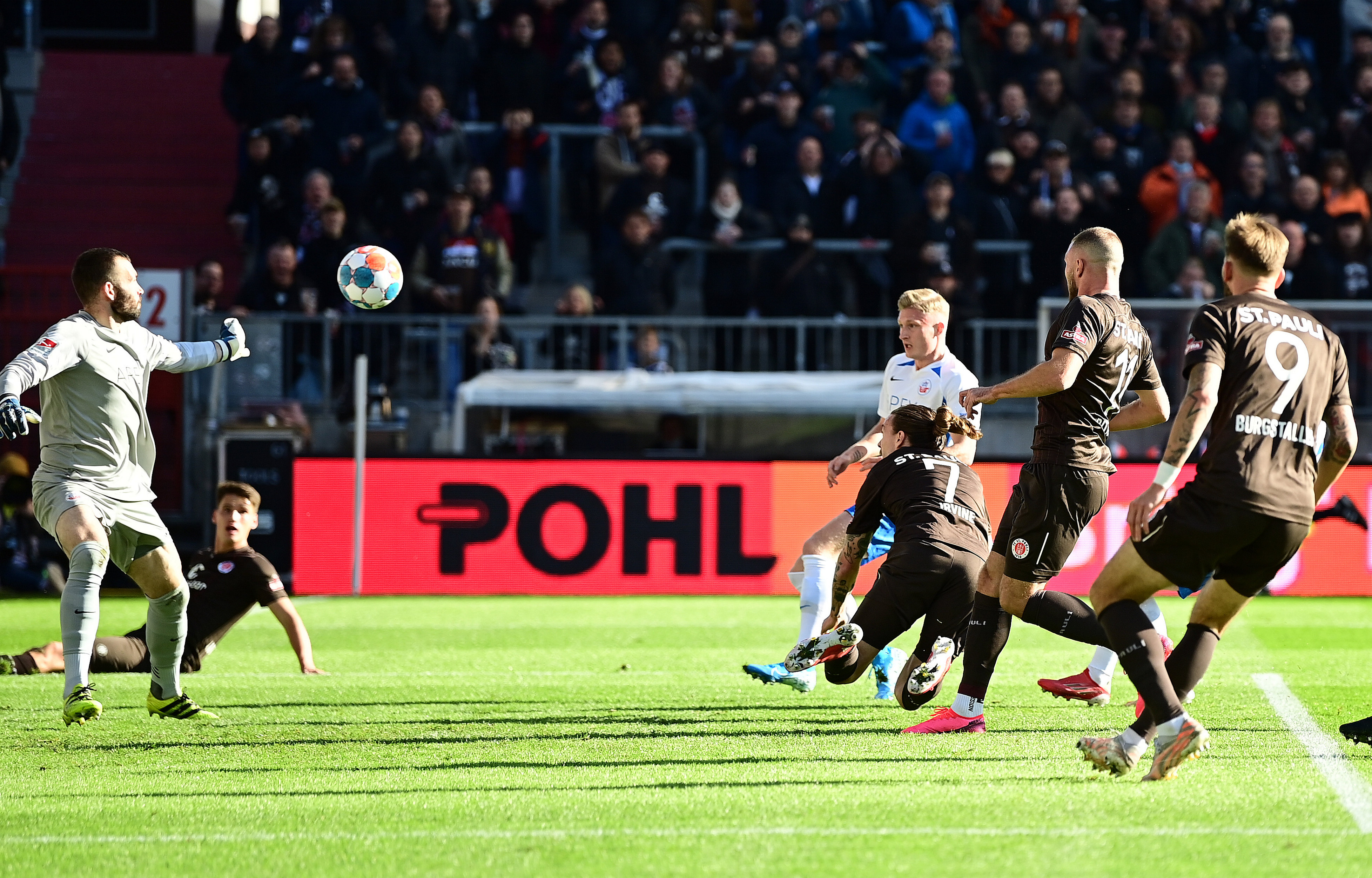 Jackson Irvine (centre) opens the scoring with his first goal for the club.