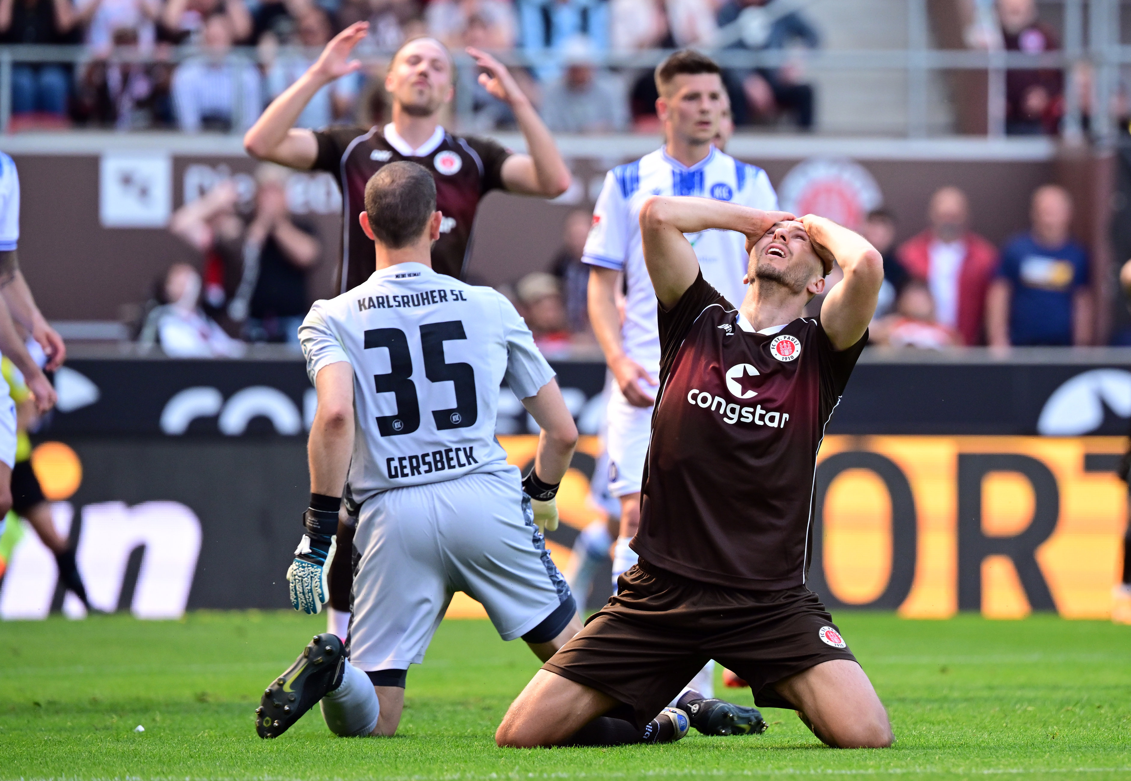 Karol Mets can hardly believe his header hasn’t gone in just before the interval.