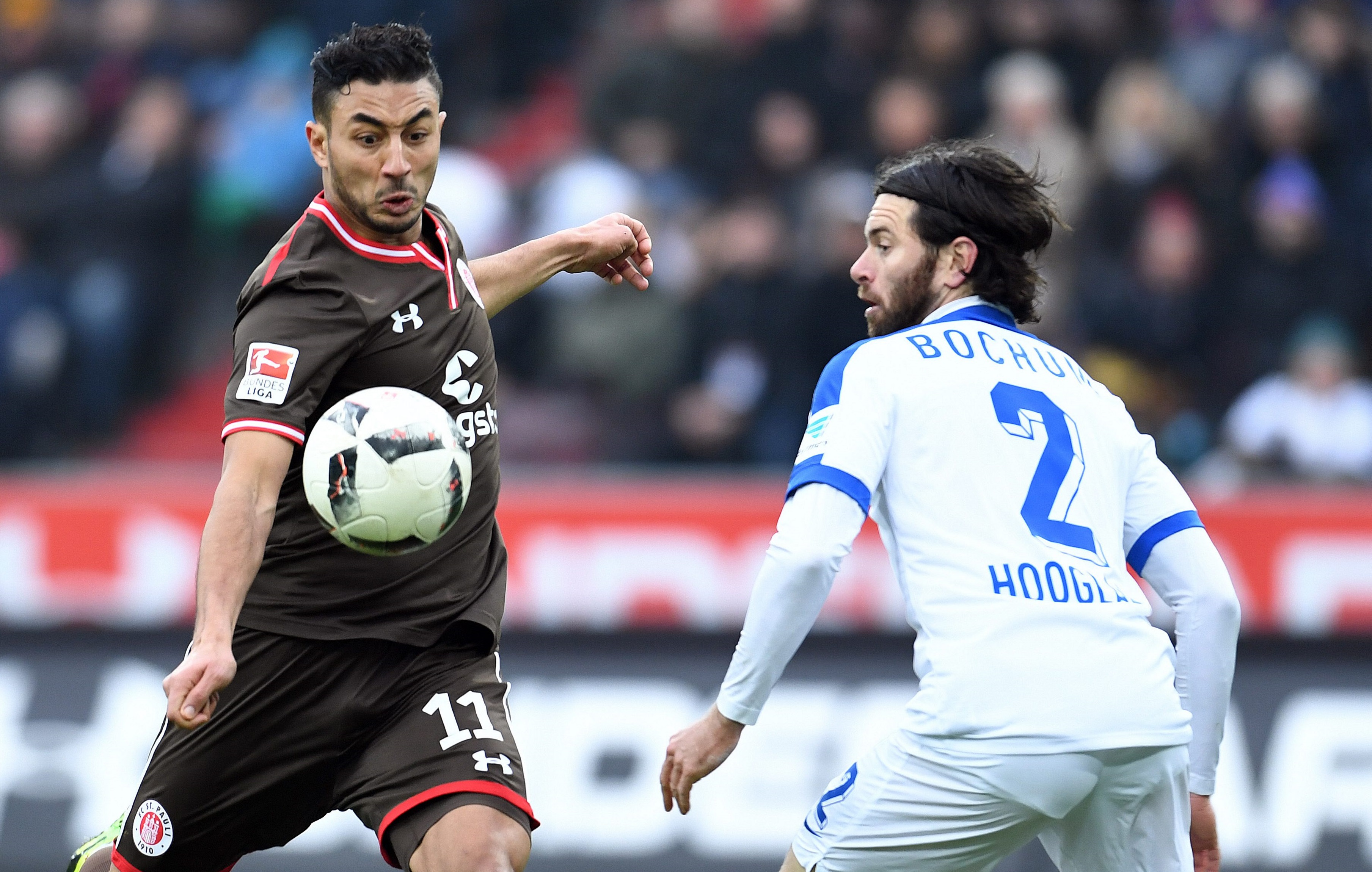 A man to the good, Ewald Lienen's side stepped up the pressure in the first half but Bochum held on to their 19th minute lead through Mlapa.