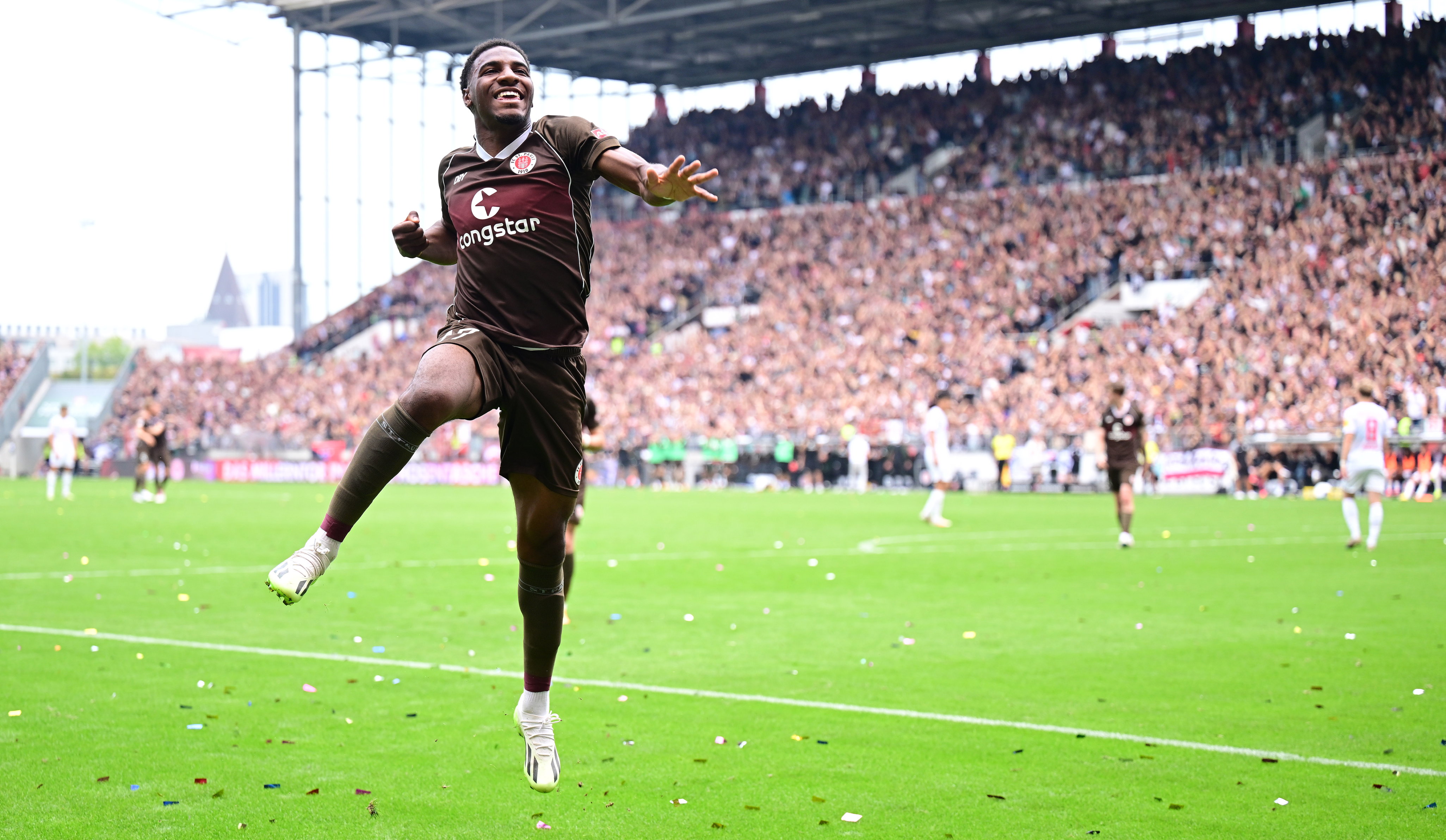 Oladapo Afolayan celebrates his first league goal since the 4-3 win at Kiel back in May.