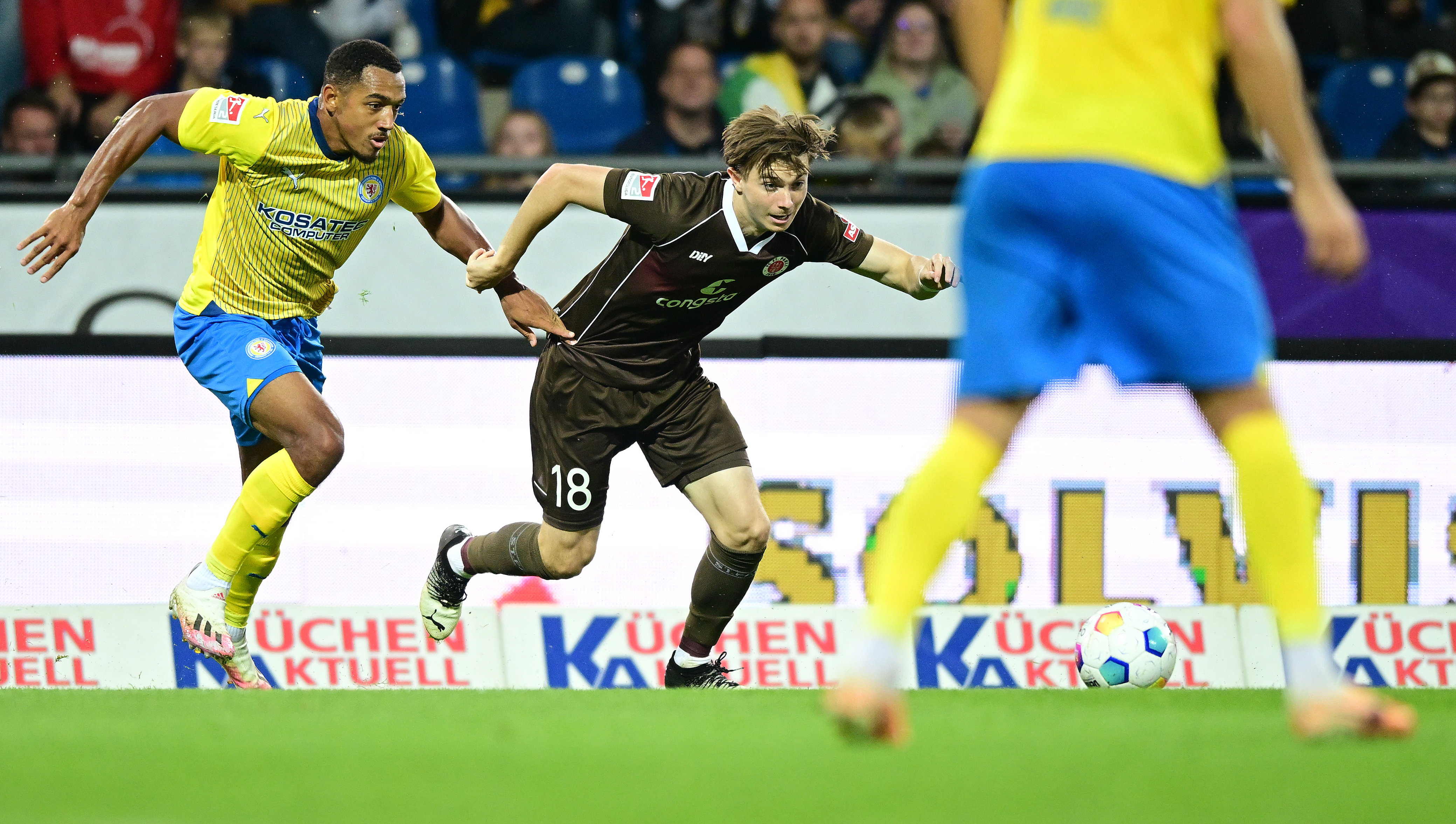 Banks, here under challenge from Braunschweig's Anton Donkor, came on as a substitute with 15 minutes left of the reverse fixture in September and sustained a serious knee injury shortly before the final whistle.