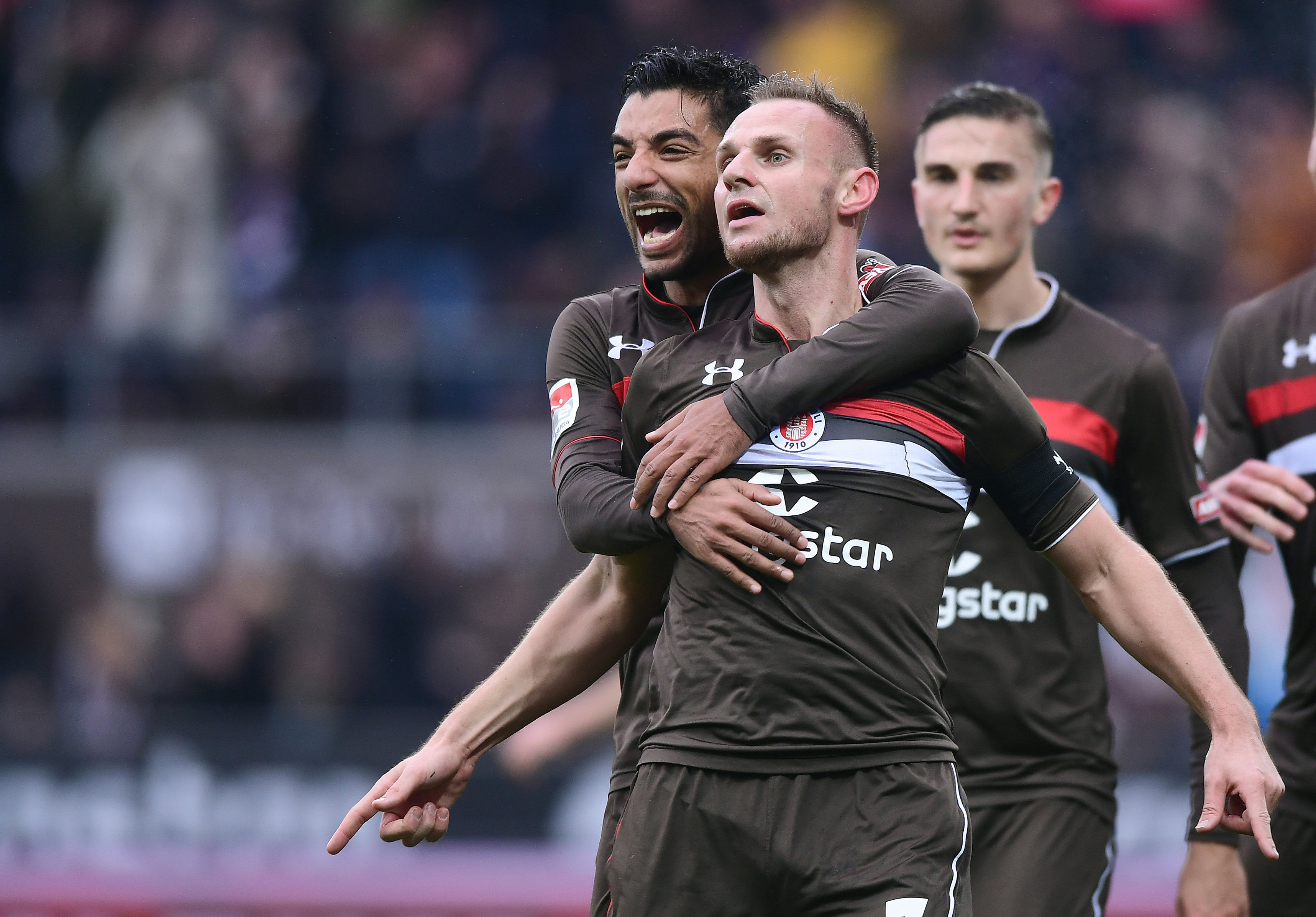 Sami Allagui hugs goalscorer Bernd Nehrig in the 16th minute.